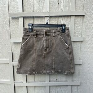 Free People brown denim mini skirt with a distressed look 🫶🏻🦋✨
